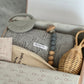 Caja de regalo - Baby essentials Pebble con sonajero rattan
